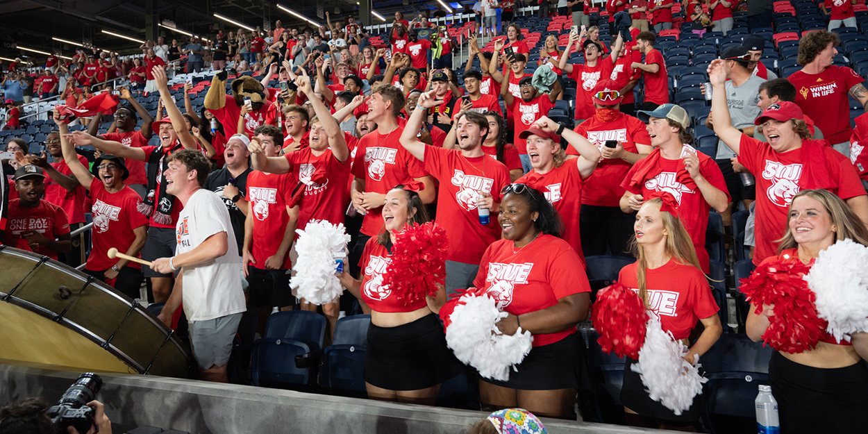 SIUE students cheering the SIUE Men's Soccer team at the SIUE vs SLU Bronze Boot Game in St. Louis, Mo.