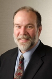 A portrait photo of Dr. Norris Manning