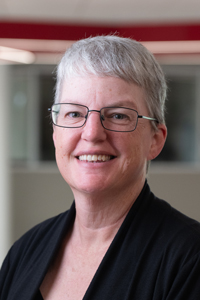 A portrait photo of Kim Bosco