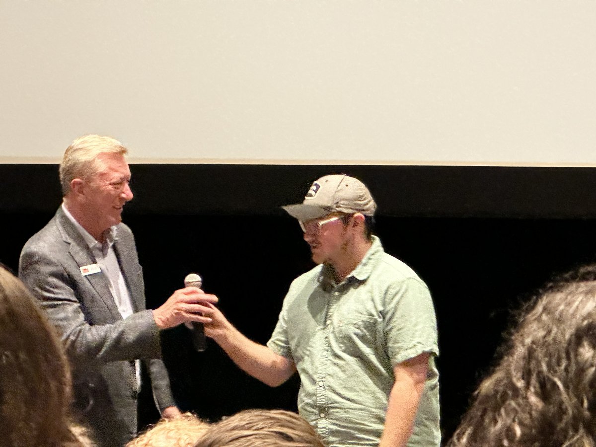 Mass Communications student receiving an award at the Wildey Film Competition