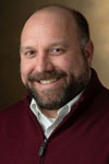 A portrait photo of Dr. Mark Poepsel