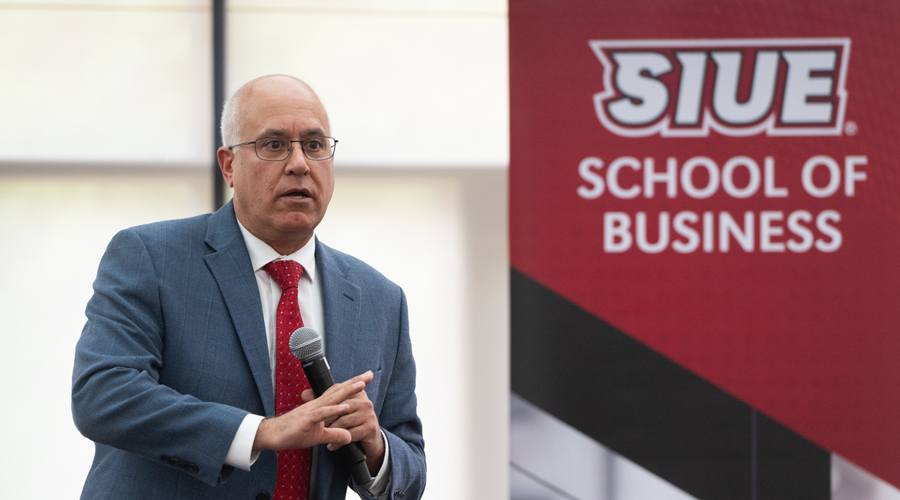 SIUE Dean speaking with a microphone.
