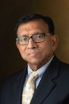 A portrait photo of Joe Vithayathil