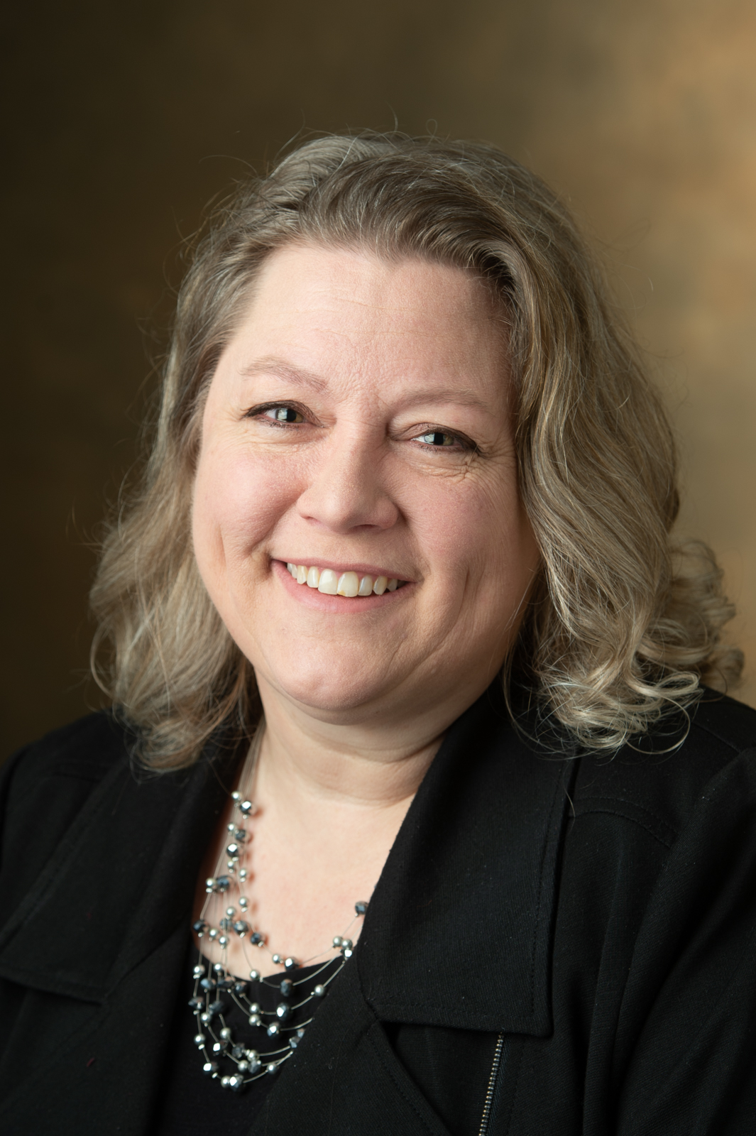A portrait photo of Kathy Carr - Coming Soon!