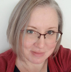 A portrait photo of Julie Wyatt