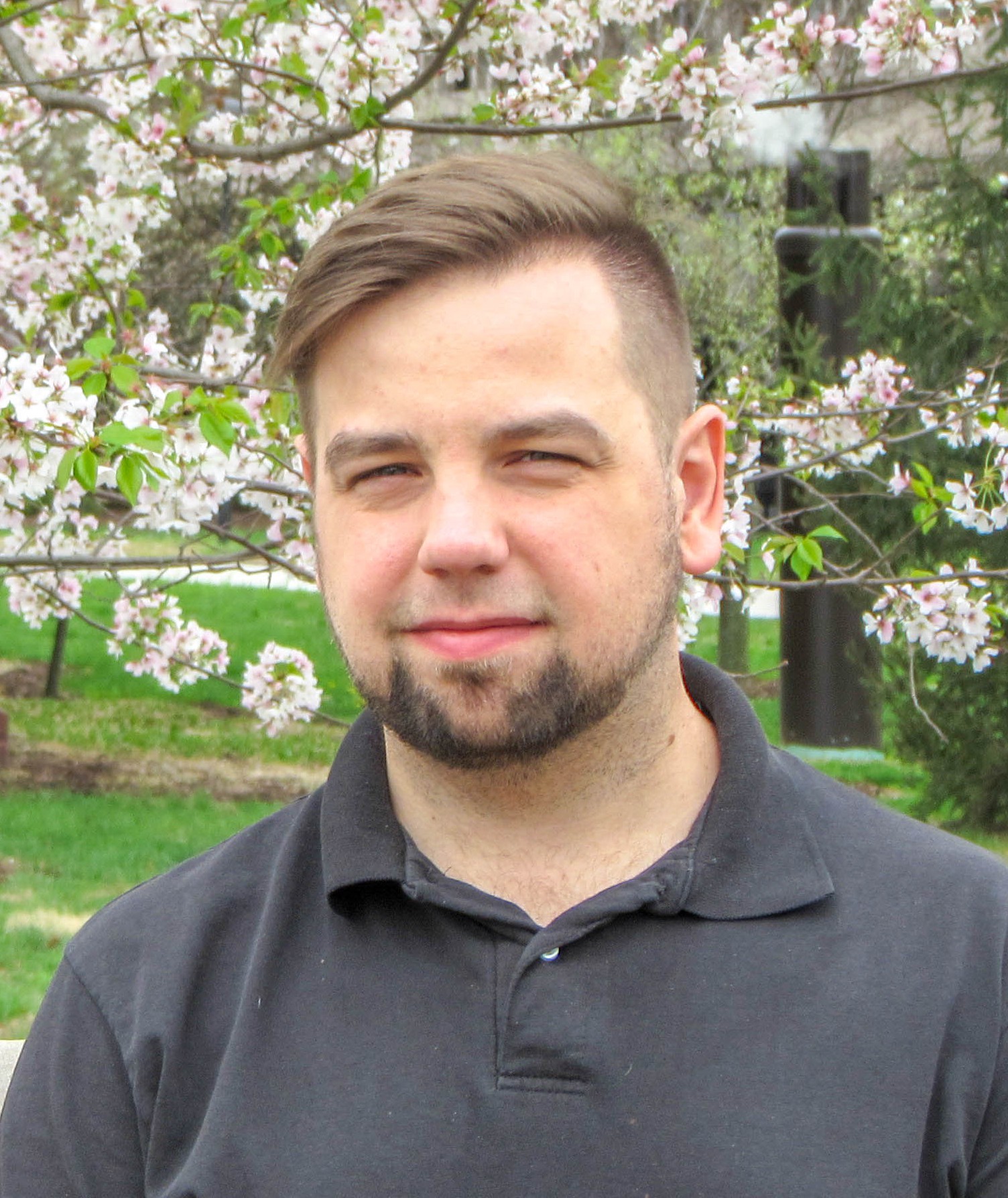 A portrait photo of Mark Phillips