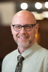 A portrait photo of Greg Everett