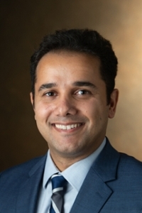 A portrait photo of Arman Dabiri