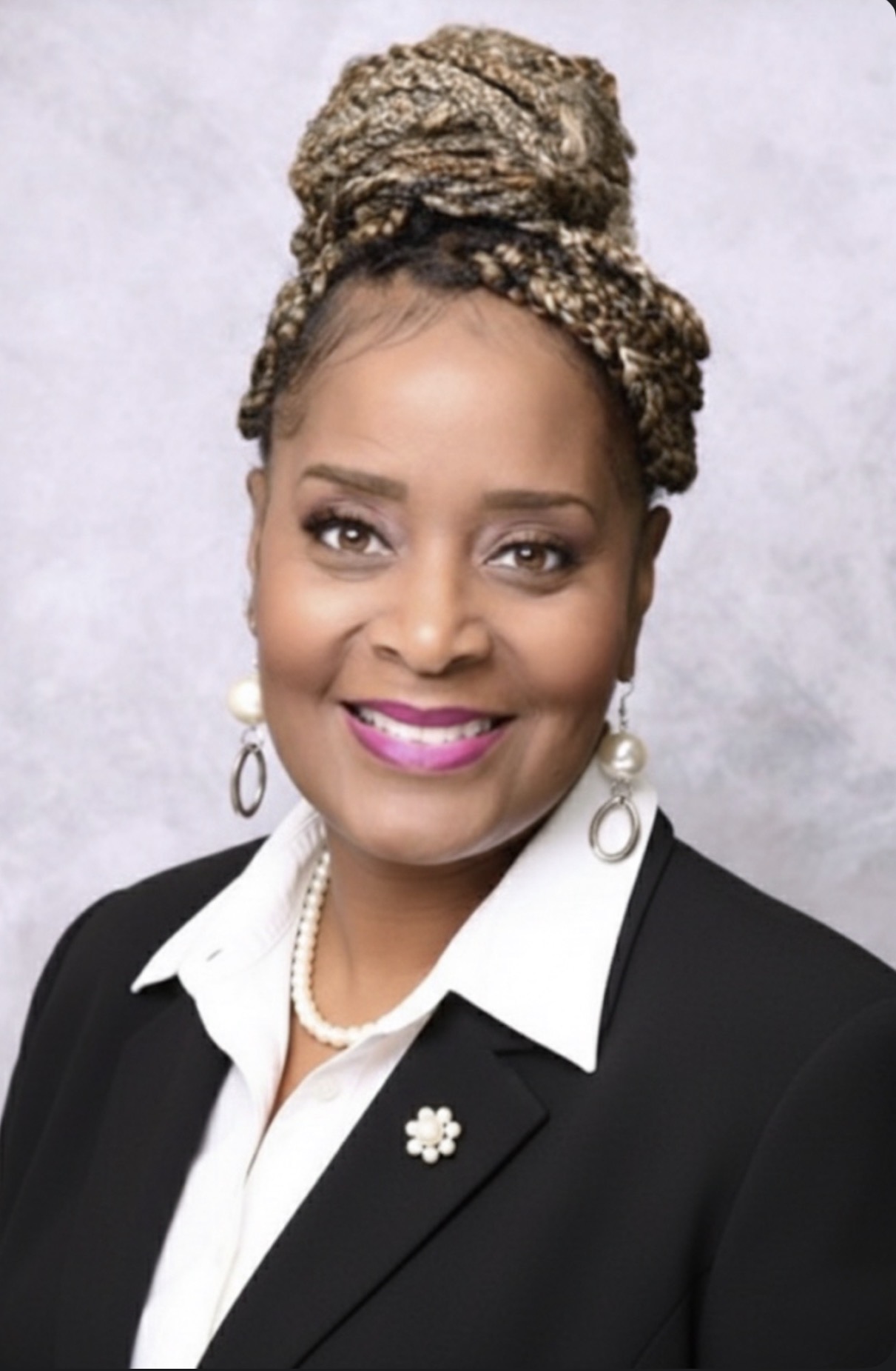 A portrait photo of Mica Ike