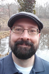 A portrait photo of Dr. Brian Henderson