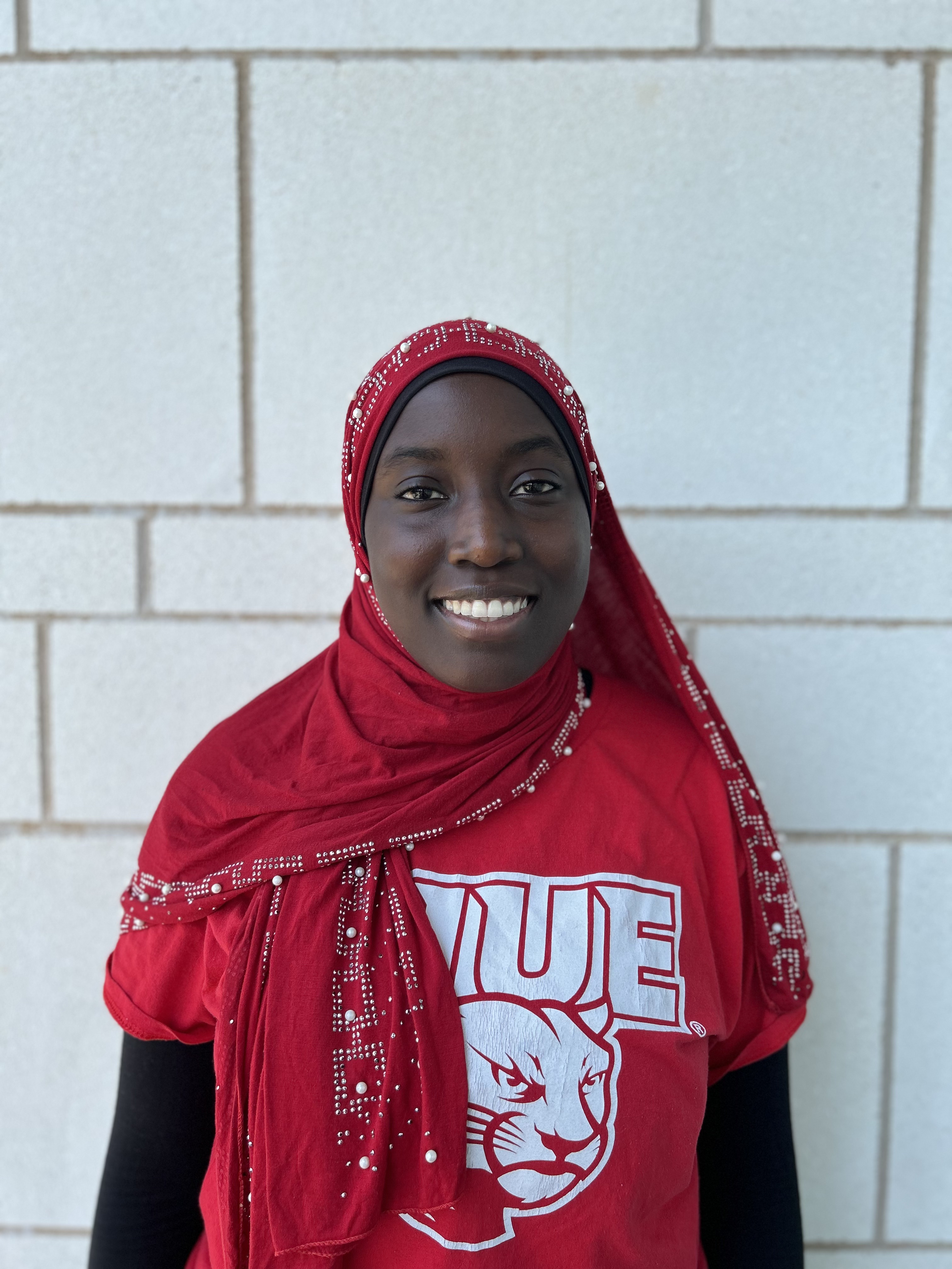 A portrait photo of Yassine Ndiaye