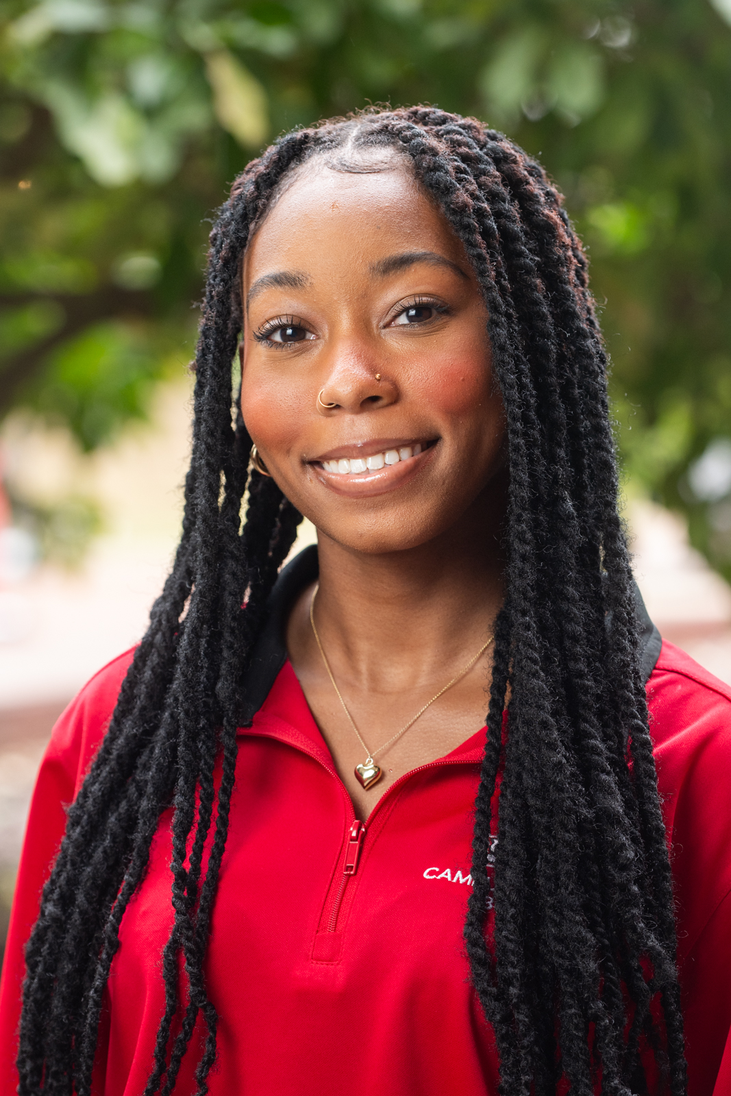 A portrait photo of Madison Lacey-Ferguson (she/her)