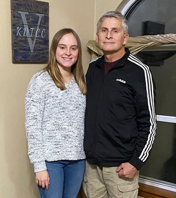 SIUE junior Courtney Vollmer (left) with her father Ken Vollmer, a grounds worker in the Office of Facilities Management, was awarded a SIUE Staff Senate Faculty &amp; Collective Bargaining scholarship.