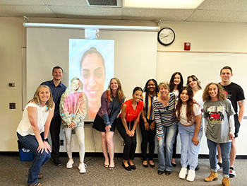 (L-R) Dr. Jen Zuercher, Kevin Jackson, Taylor Swank, Dr. Sepideh Kaviani (on the screen), Sarah McConnell, Johanna Hartig, Britney Herron, Cindi Inman, Abbey Roberts, Alyssa Real, Madison Rodotz, Dr. Kathy Mora and Andrew Youck.