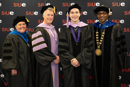 SIUE Provost and Vice Chancellor for Academic Affairs Denise Cobb, PhD, SIU SDM Interim Dean Duane Douglas, DMD, student speaker Eric Kubacki, DMD, and SIUE Chancellor James T. Minor.