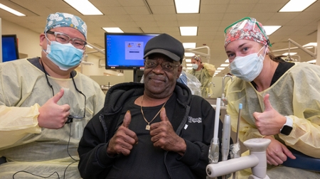 Representatives from SIUE and Enterprise Holdings Foundation cut a ribbon to signify the dedication of the Enterprise Holdings Foundation Atrium and state-of-the-art robotics lab in the SIUE School of Engineering Building.