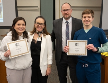 (L-R) Julia Fryzel, second-year dental student; Nathalia Garcia, DDS, MS, SIU SDM interim director of research and chair of the Department of Applied Dental Medicine; Saulius Drukteinis, DMD, MS, PhD, dean of SIU School of Dental Medicine; Brian Babu