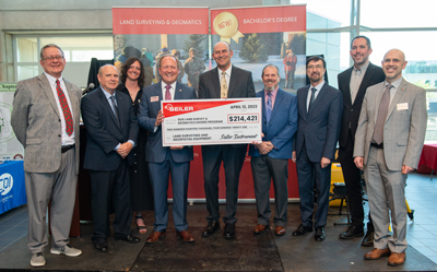 Seiler Instrument presents their gift to SIUE’s land surveying and geomatics program. 