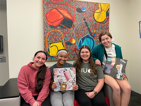 Students holding their vision boards