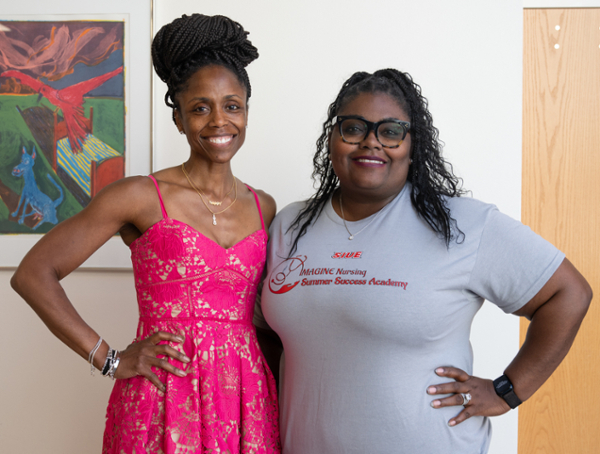 Dr Ampadu and Dr Myjal Garner pose for photo