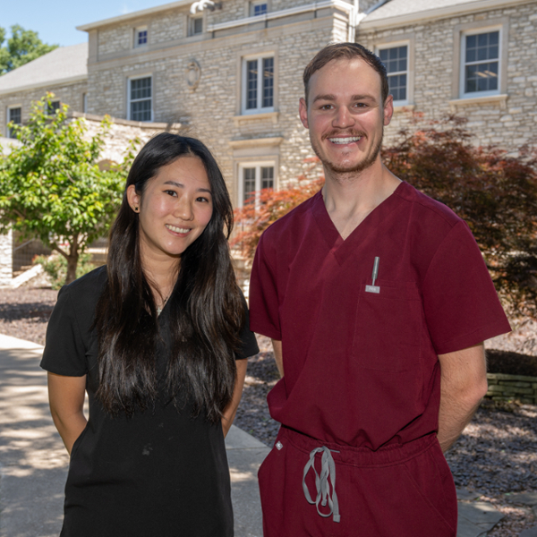 Angelica Song and Jared Ellingson stand in photo together