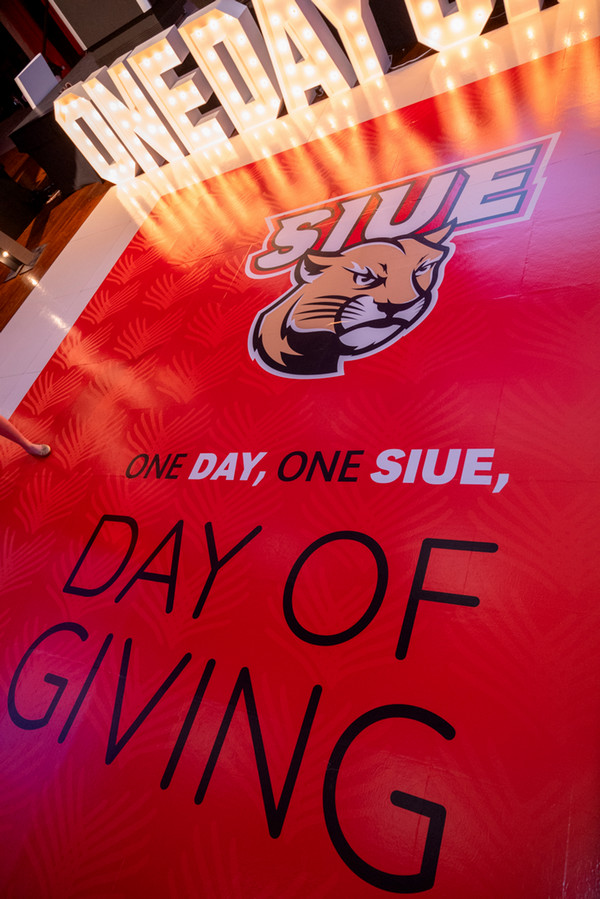 Image of Cougar and One Day One SIUE mark on ballroom floor