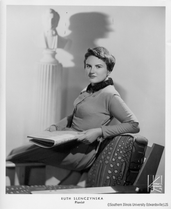 Ruth Slenczynska archive photo with her leaning back on chair and music in hand