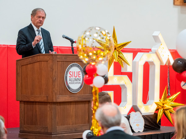 SIUE Trustee Ed Curtis gives keynote speech at podium