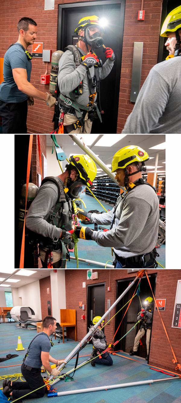Rescuers in gear near an elevator