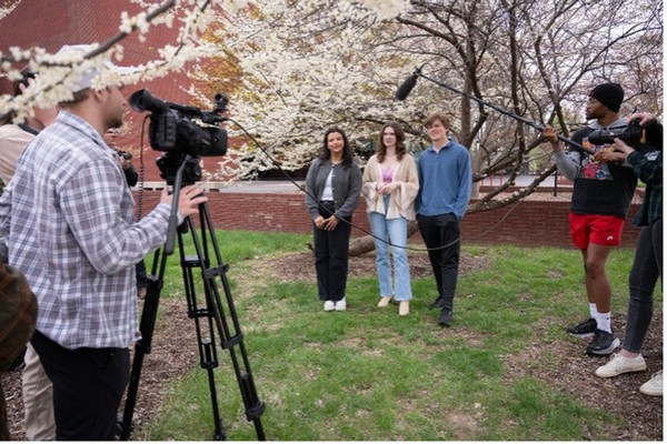 Student crew filming on campus