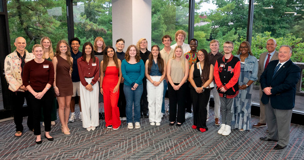 Meridian Scholars pose with faculty and staff