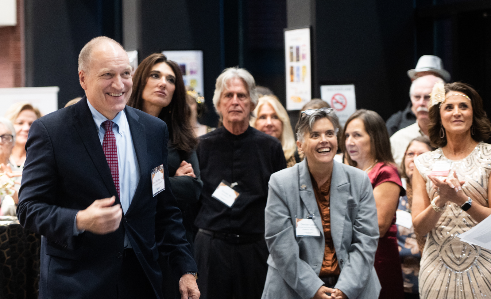 Candid photo of Dr. Mahony, First Lady Laura, Provost Cobb, and Julie Babington