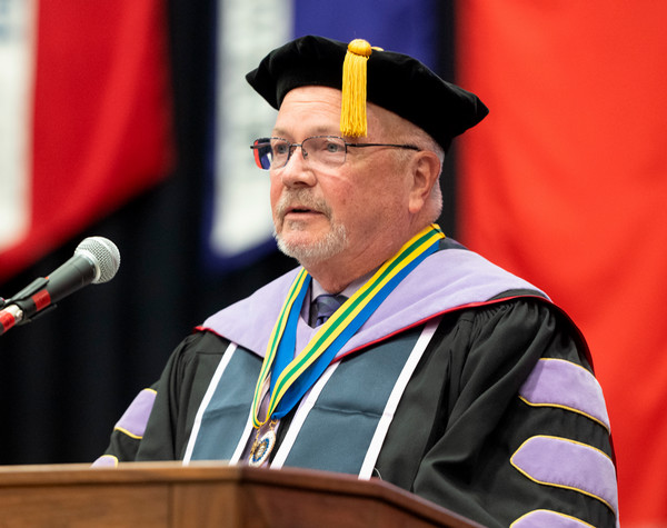 Dean Emeritus Bruce Rotter speaks from the podium