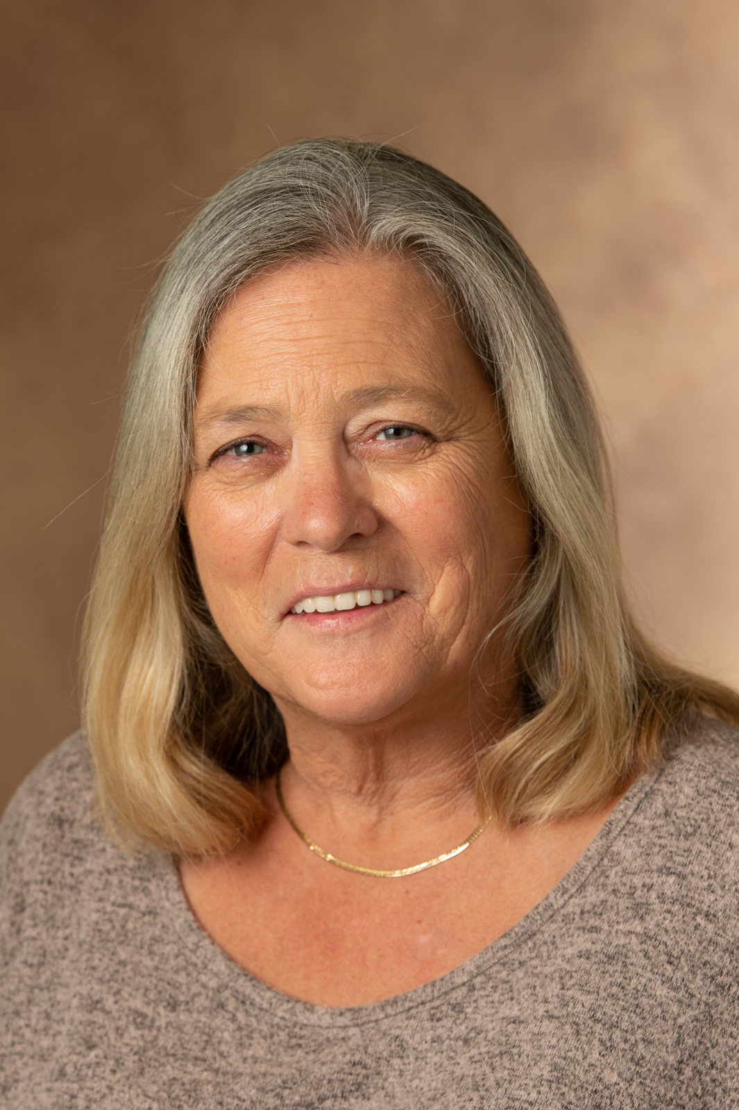 A portrait photo of Diane Metz