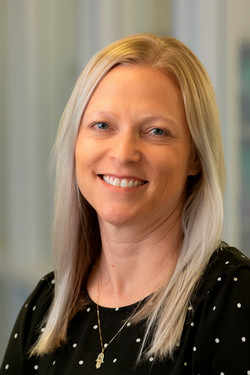 A portrait photo of Kelly Gable  
