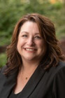 A portrait photo of Carol Garrison