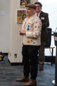 Eric addressing the audience at shark tank