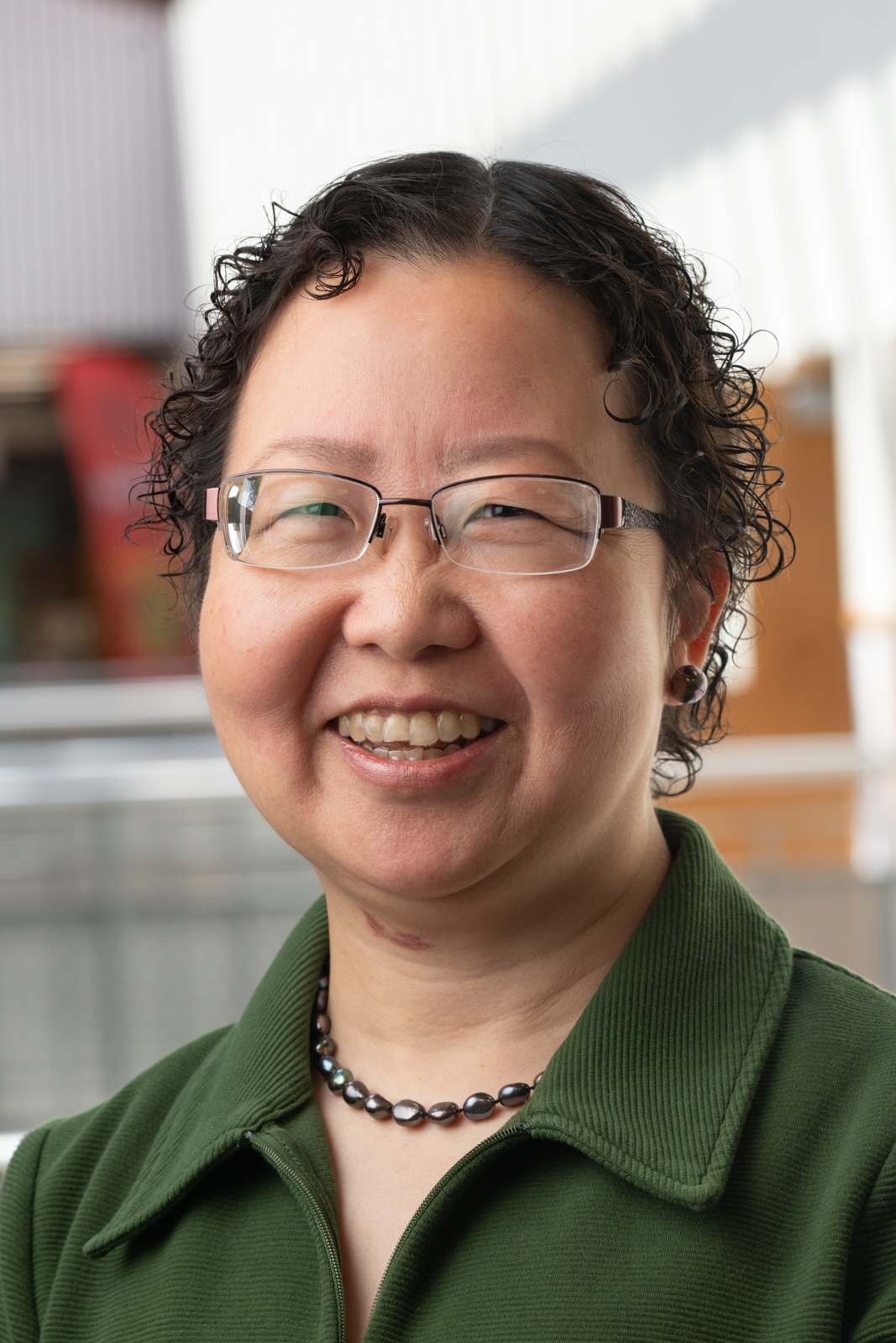 A portrait photo of Huaibo Xin, DrPH, MD, MPH