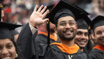 A SIUE Graduate student at commencement
