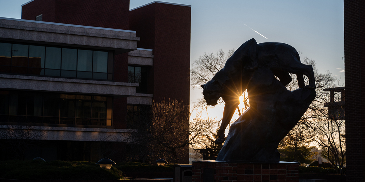 SIUE students walking on campus on a late summer day. 