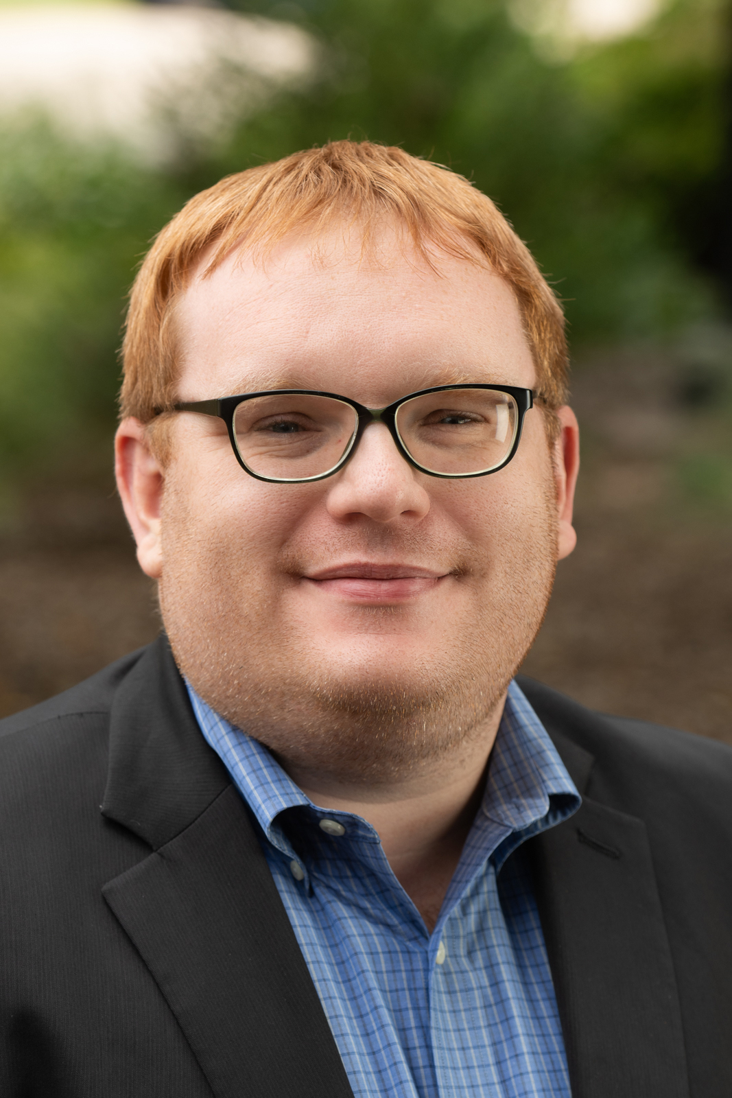 A portrait photo of Michael Tadlock-Jackson