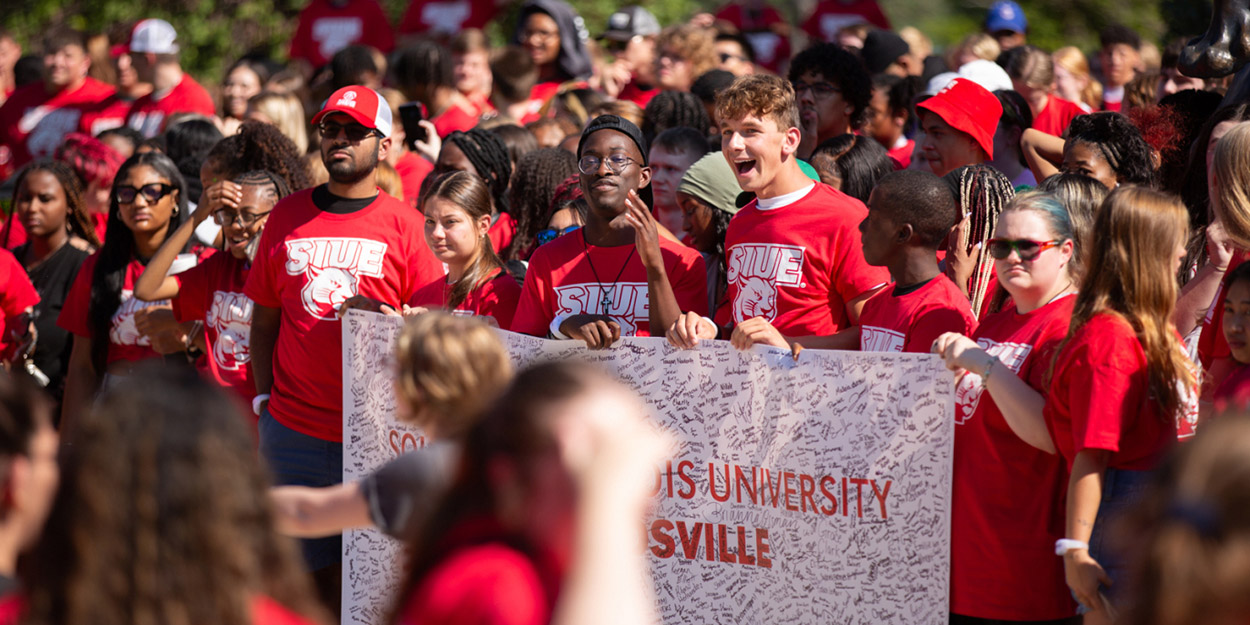SIUE students walking on campus on a late summer day. 