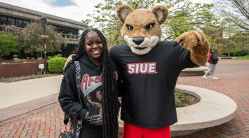 SIUE student with Eddie the Cougar